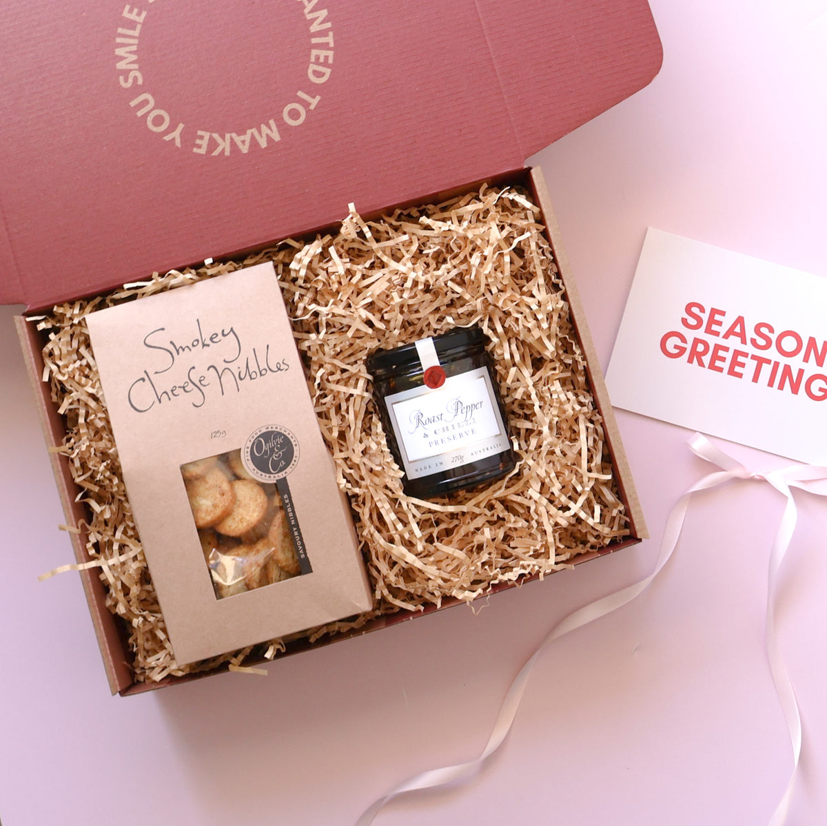 Mini Preserve & Nibbles Gift Box with Ogilvie & Co roast pepper and chilli preserve and smokey cheese nibbles in a kraft gift box with pink ribbon