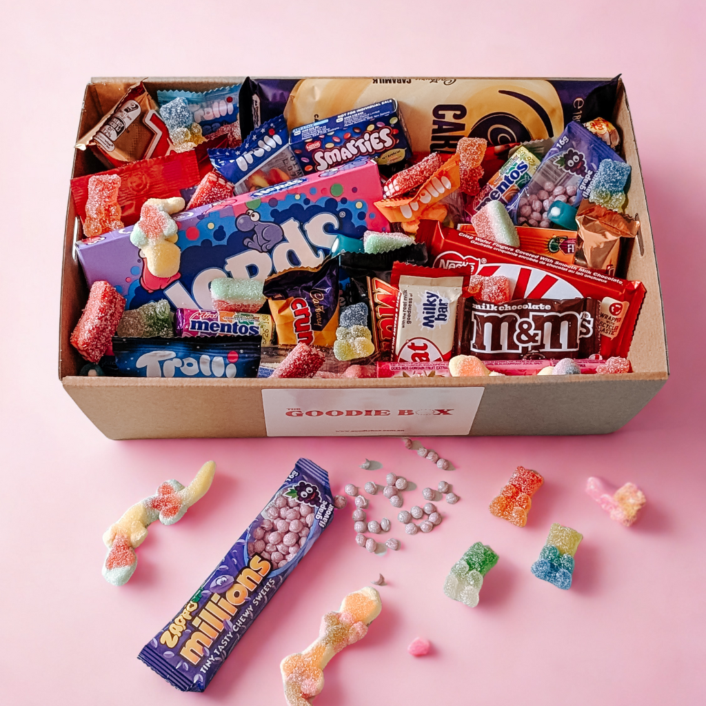 Bright and joyful dessert box loaded with nostalgic candies and chocolates to make someone’s day