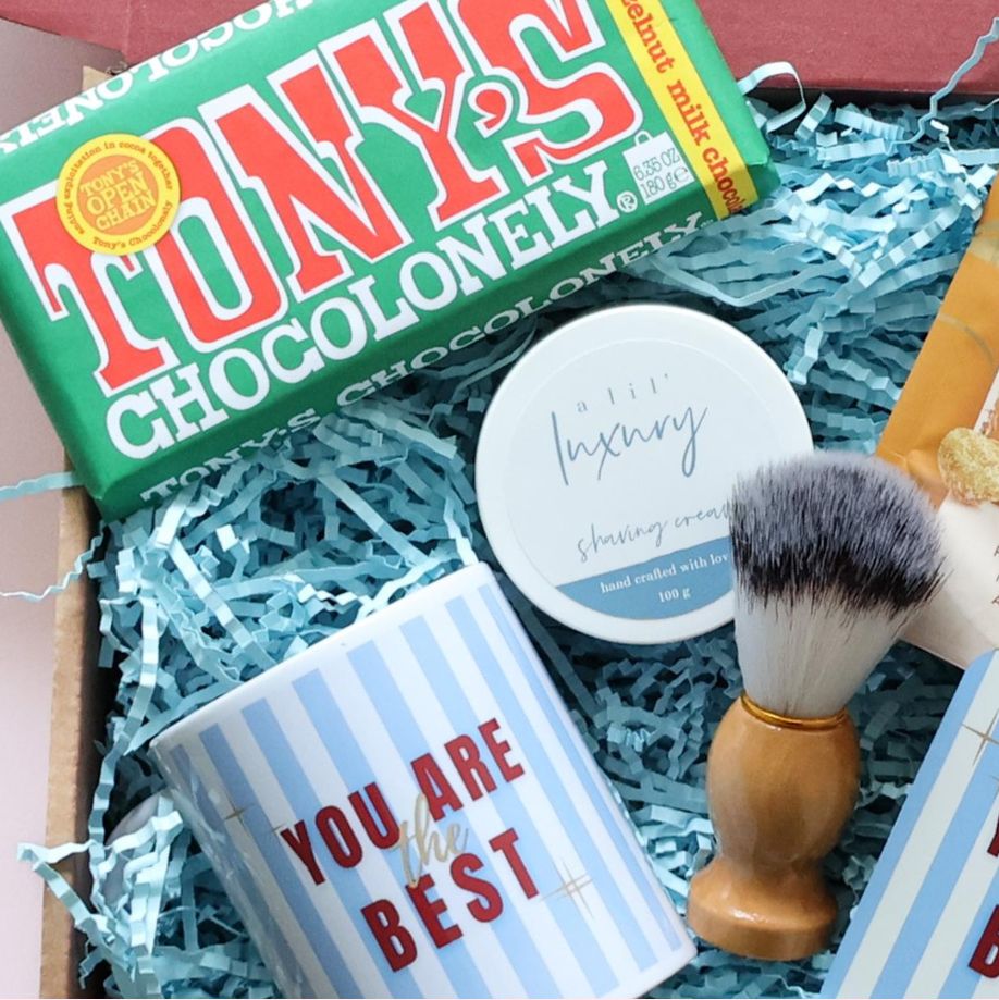 Ultimate birthday gift box for him detail showing Tony's Chocolonely A Lil Luxury shaving cream and brush You Are the Best mug Perth