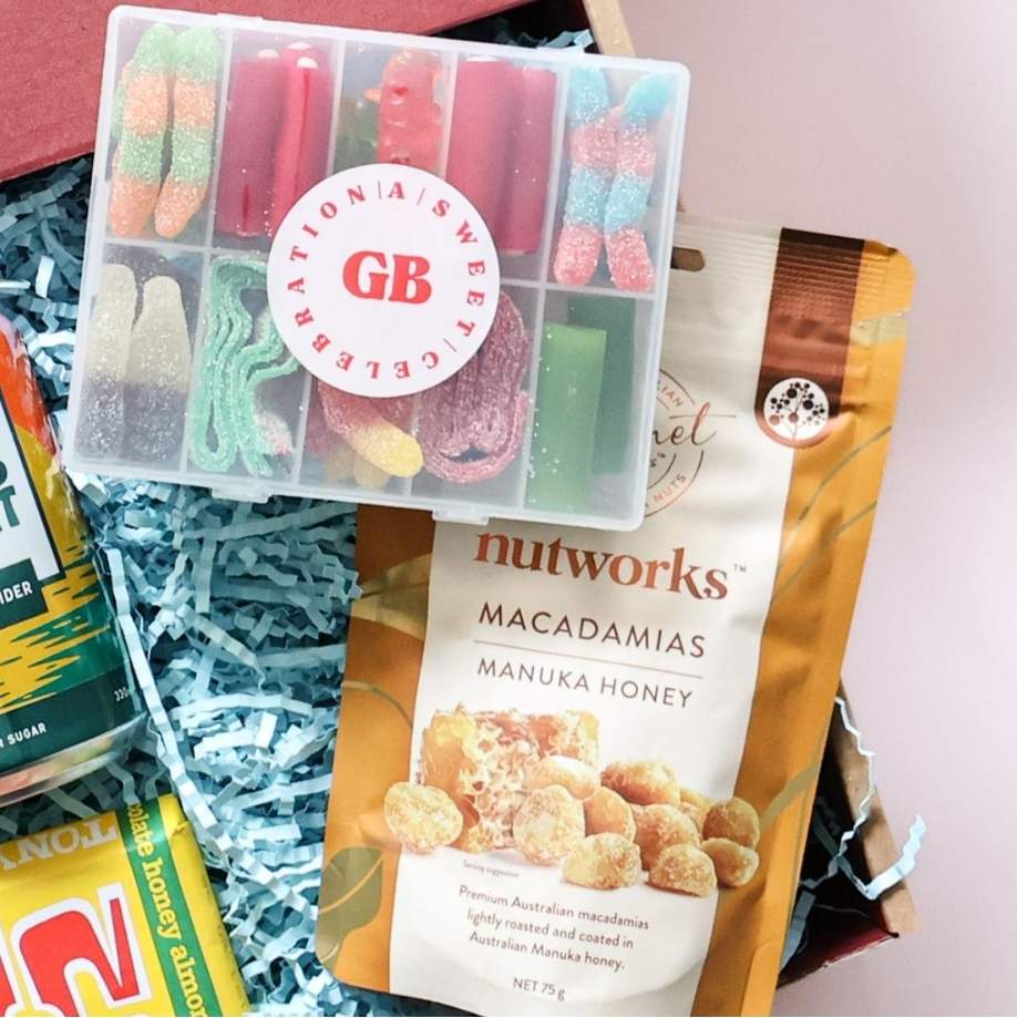 Birthday beers gift box detail showing Gage Roads Hazy As pale ale and Pinkys Sunset cider with Tony's Chocolonely chocolate bar Perth