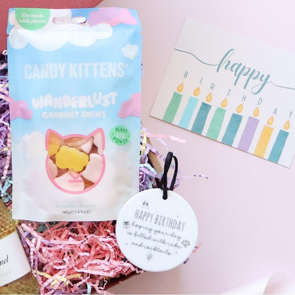 Birthday Bubbles Gift Box close up showing Candy Kittens Wanderlust gourmet chews and Happy Birthday ceramic disc keepsake Perth