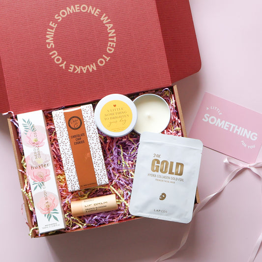 Brighten your day pamper hamper with Huxter orange blossom hand cream, lip balm and chocolate chip cookies