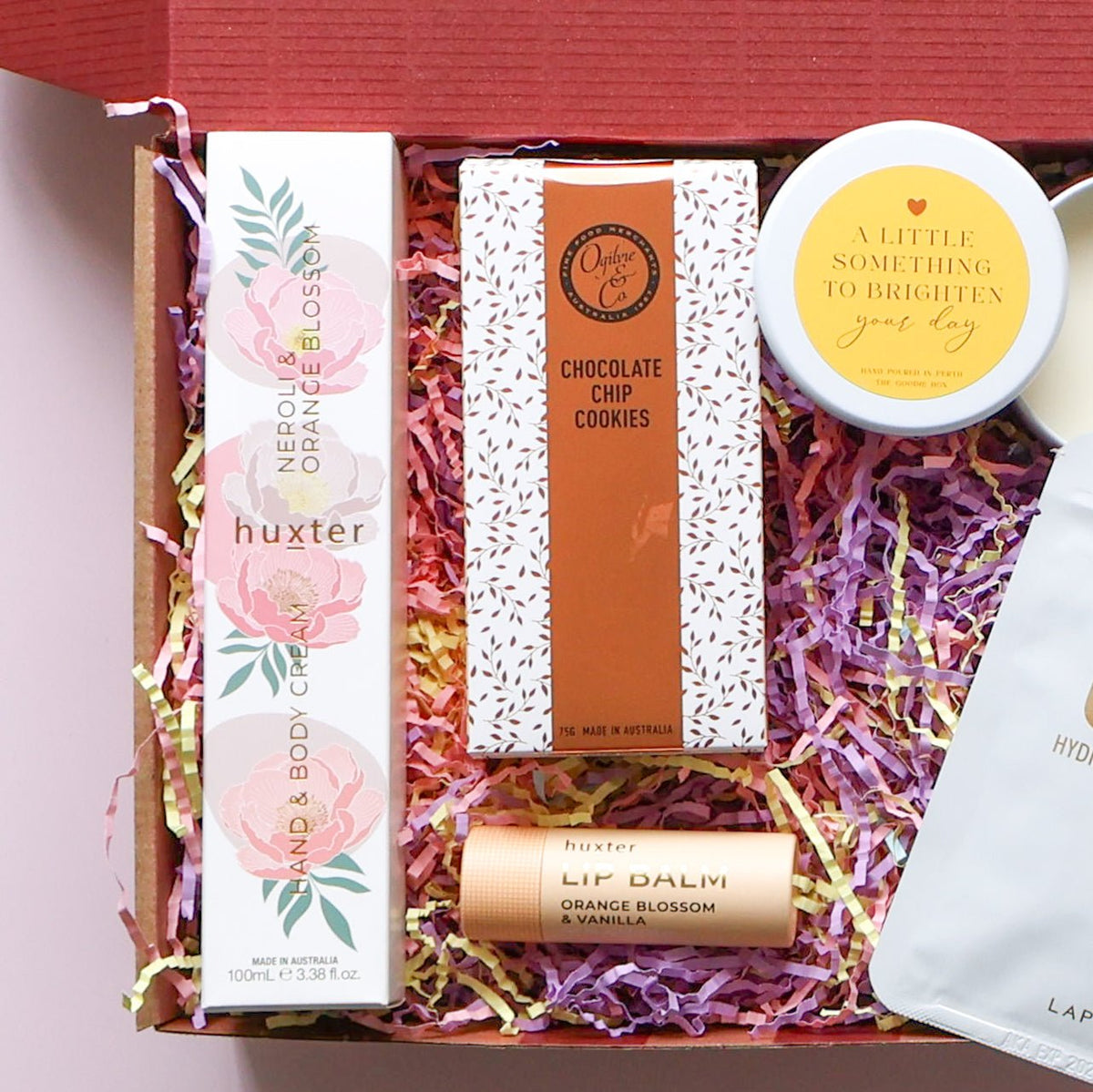 Brighten your day pamper hamper with hand cream, lip balm, cookies