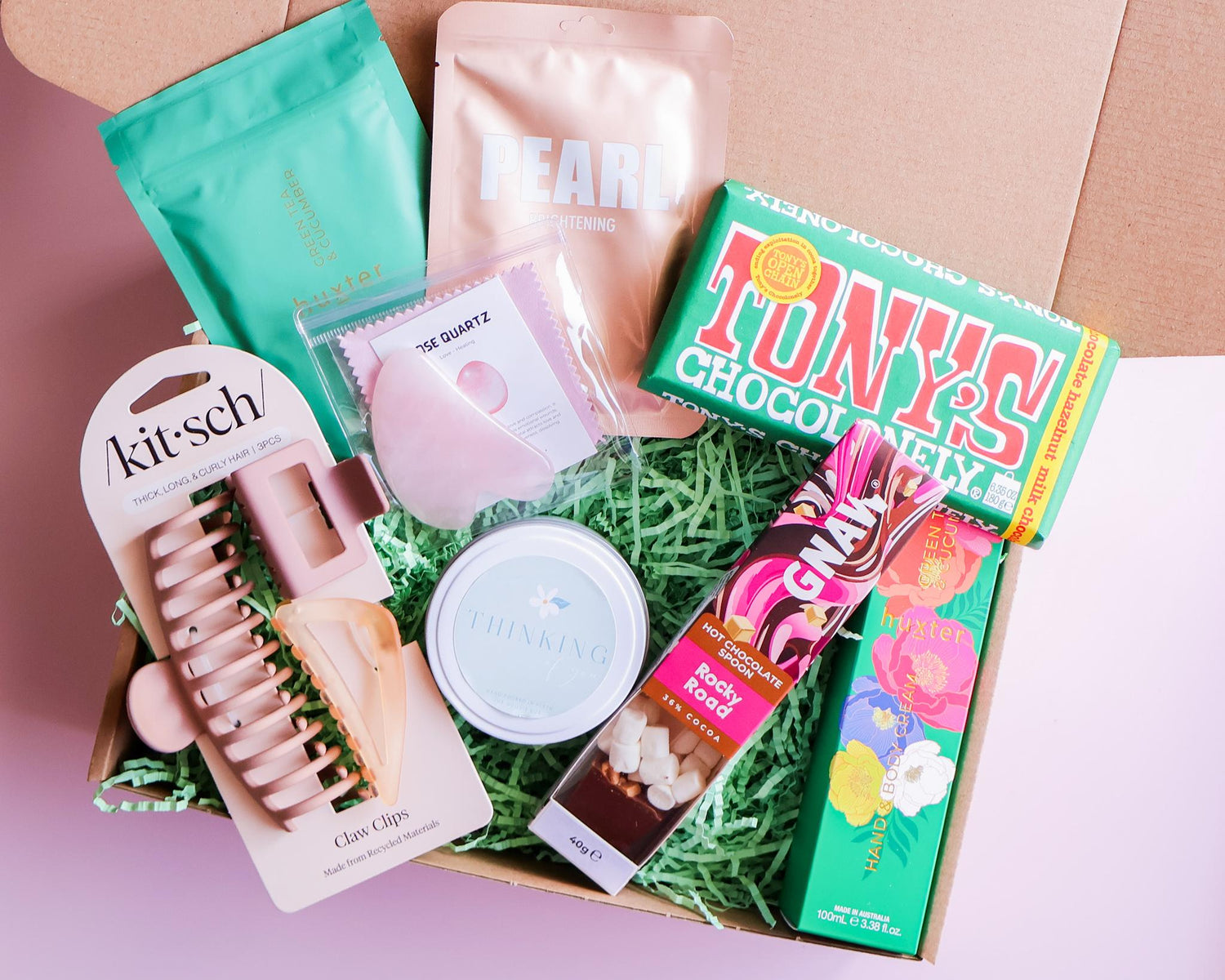 Gift hamper Perth with Kitsch claw clips, rose quartz gua sha, Tony's Chocolonely, Gnaw hot chocolate spoon and Baxter skincare
