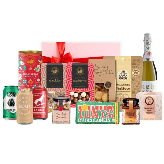 Christmas Share Hamper with Rocky Ridge, CBCo and Dingo beers, prosecco, shortbread, speckles, chocolate raspberries, smokey cheese nibbles, toasted mallows, Tony's Chocolonely, plum pudding and chocolate liqueur sauce in a pink gift box with red ribbon