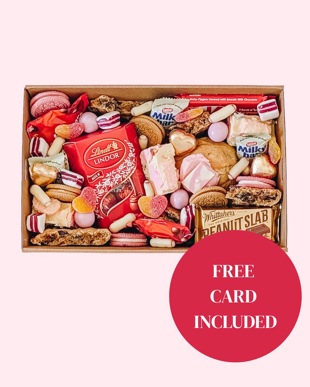 Assorted candy and chocolate box with Lindor Lindor on a white background