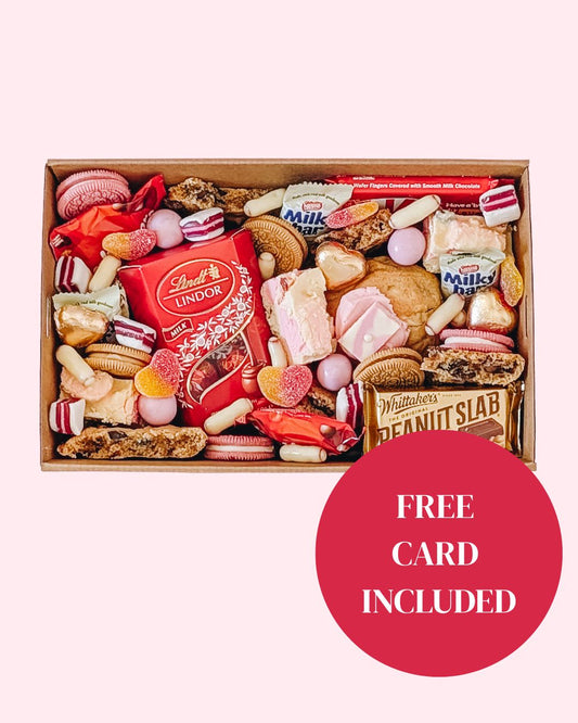 Assorted candy and chocolate box with Lindor Lindor on a white background