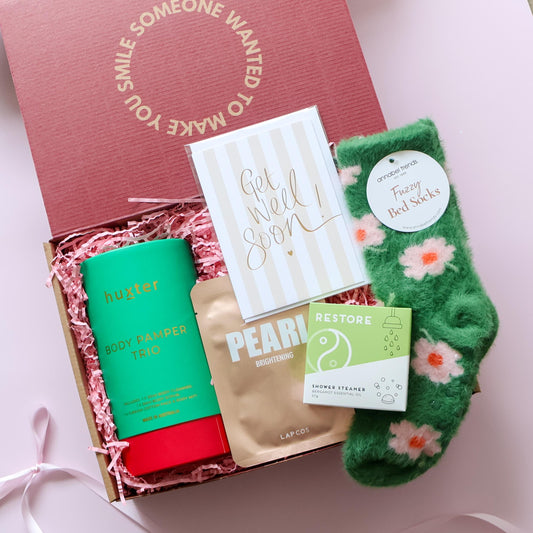 Get well soon gift box Perth with Huxter body pamper trio Lapcos Pearl face mask Restore shower steamer and fuzzy bed socks