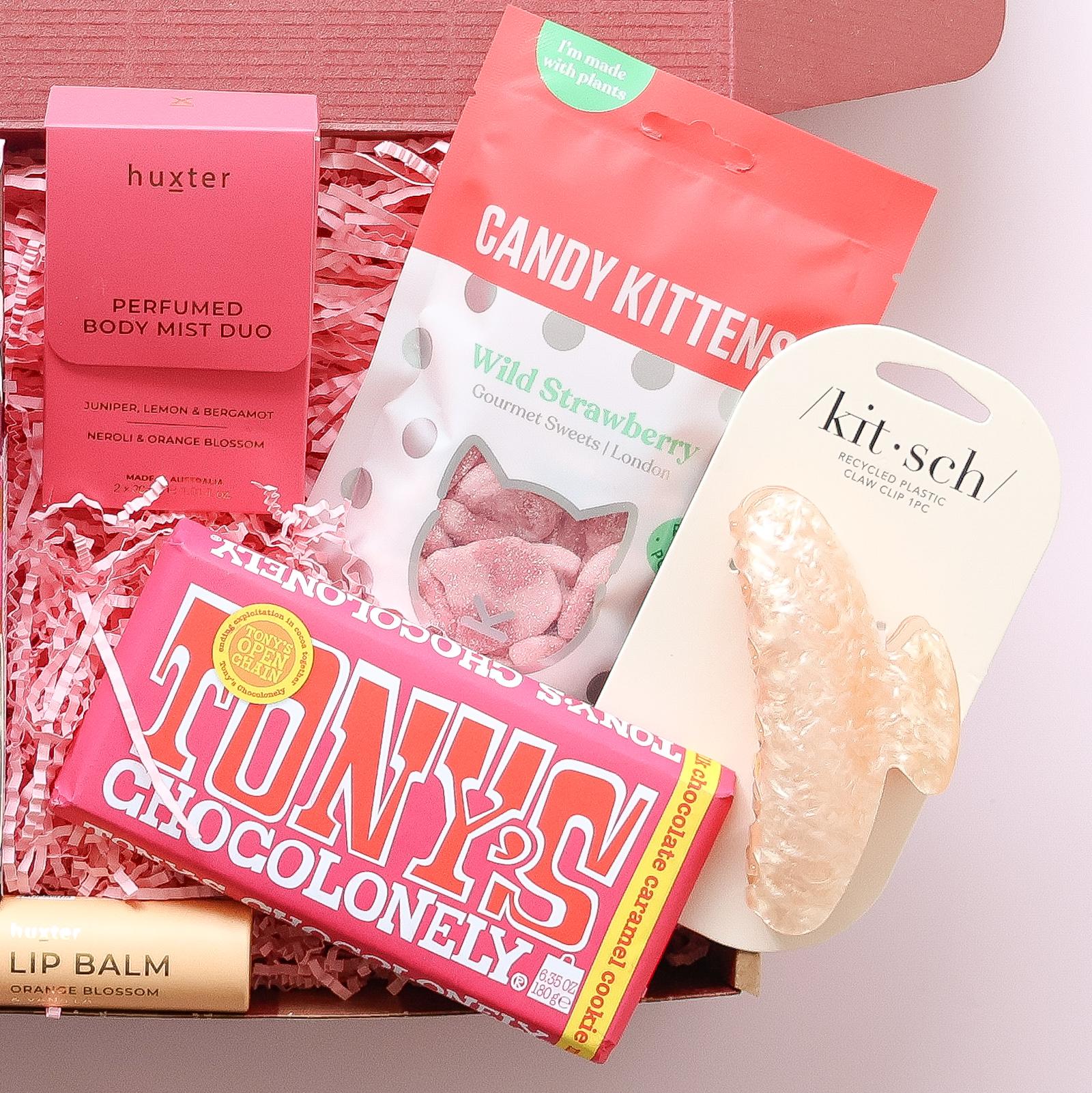 gift hamper for her with Huxter body mist duo, Tony's Chocolonely chocolate, Candy Kittens sweets and Kitsch claw clip