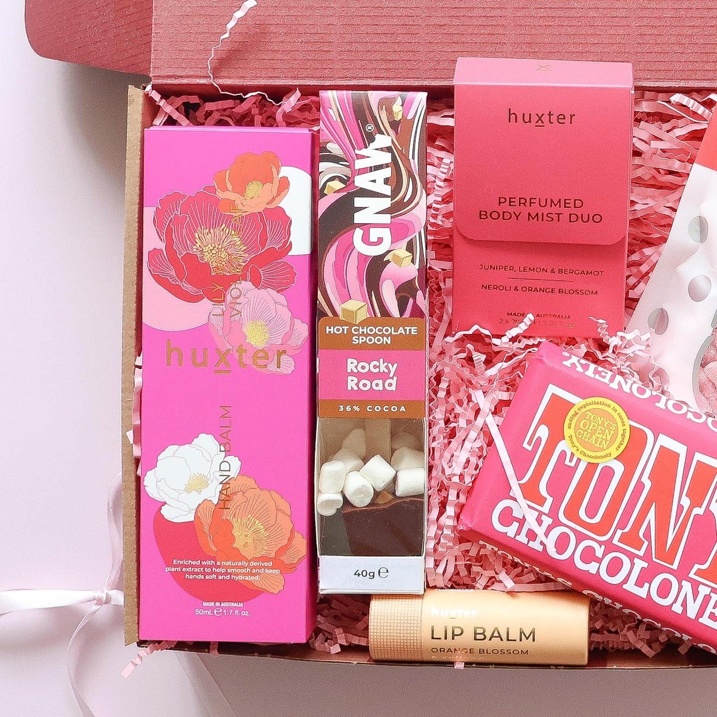 gift hamper for her Perth with Huxter hand balm, Gnaw hot chocolate spoon, body mist duo, lip balm and Tony's Chocolonely