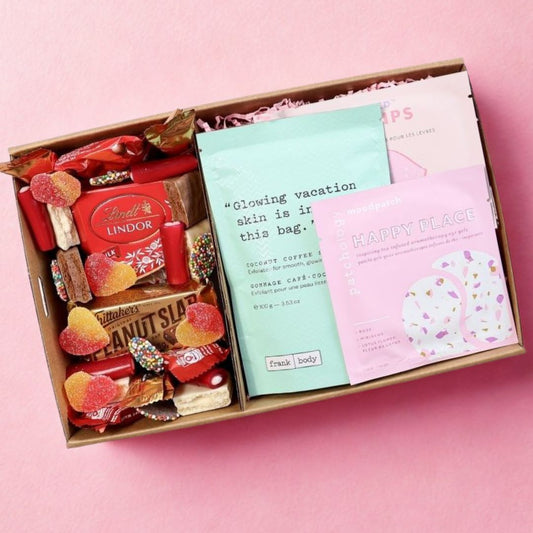 Close-up of pamper gift hamper for her with skincare essentials and indulgent chocolates Perth