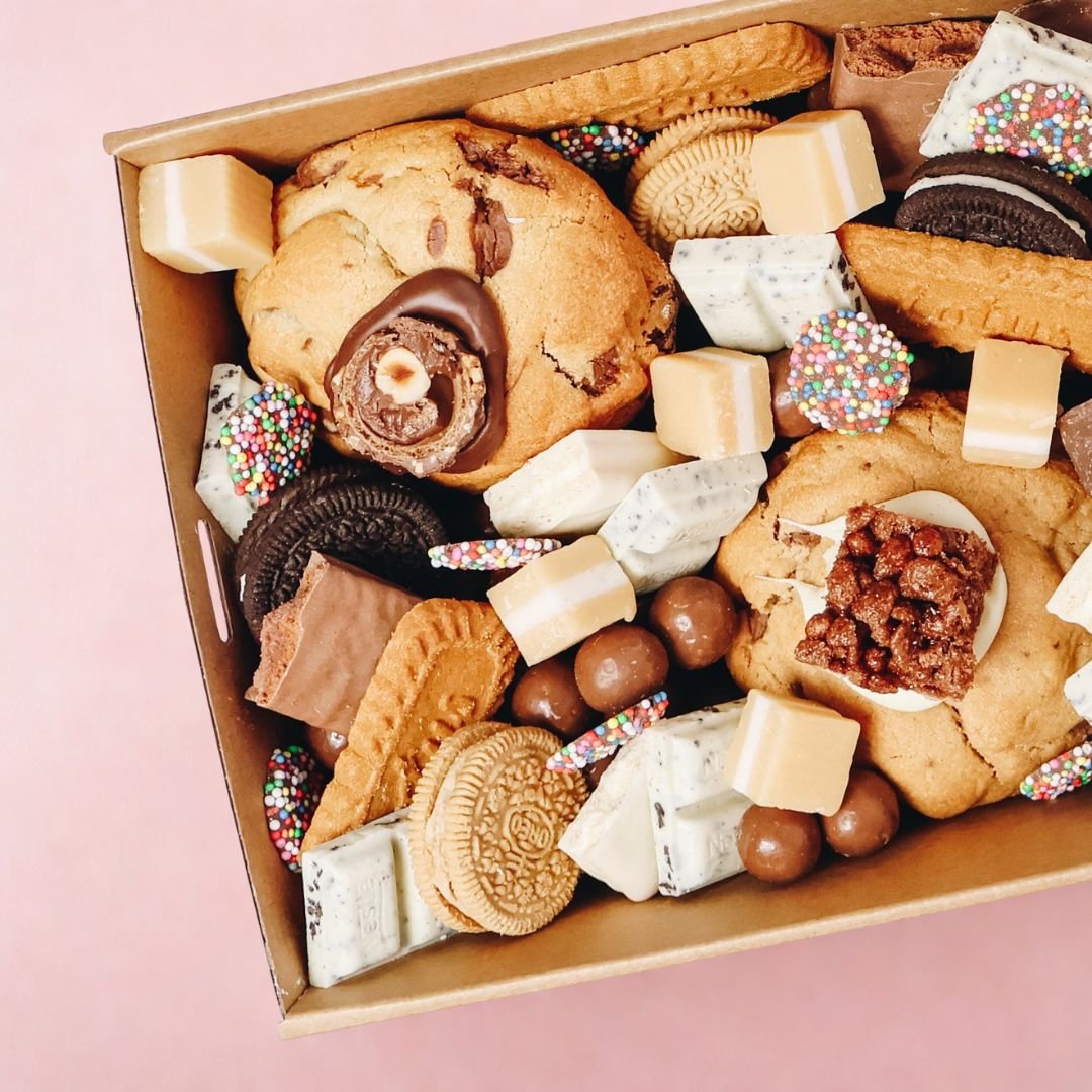 Close-up of Loaded Cookies Gift Box showing Kinder Bueno cookie, Oreos, Biscoff, fudge and Maltesers