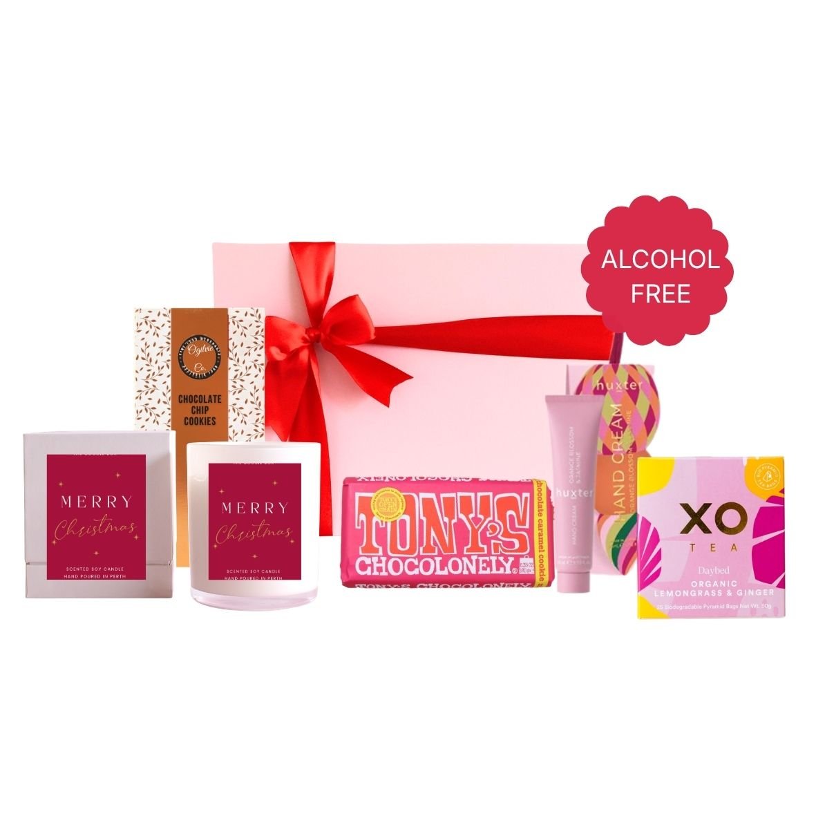 Merry & Bright Christmas Hamper with a Merry Christmas soy candle, Ogilvie & Co chocolate chip cookies, Tony's Chocolonely, Huxter hand cream and XO lemongrass and ginger tea in a pink gift box with red ribbon