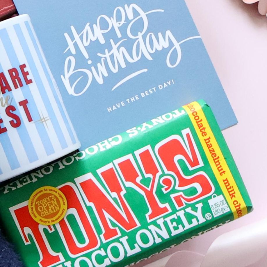 Mini birthday gift box for him detail showing Tony's Chocolonely chocolate hazelnut bar happy birthday card and You Are the Best mug Perth