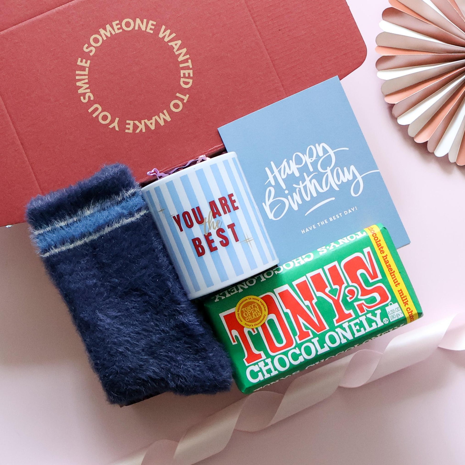 Mini birthday gift box for him open showing You Are the Best mug Tony's Chocolonely navy fuzzy socks and happy birthday card in branded red box Perth