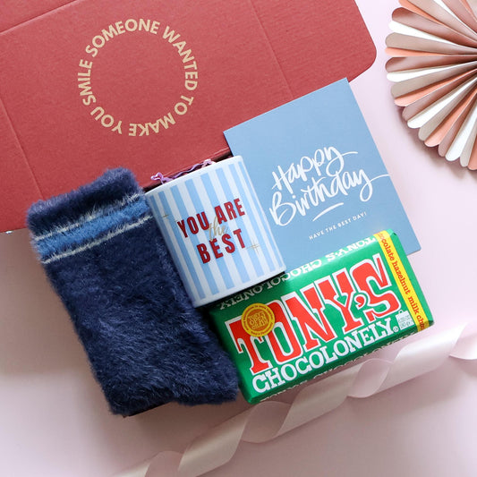 Mini birthday gift box for him open showing You Are the Best mug Tony's Chocolonely navy fuzzy socks and happy birthday card in branded red box Perth