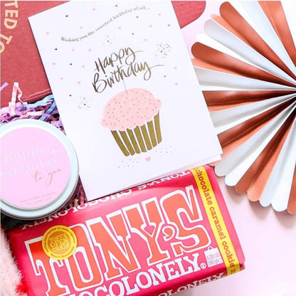 Mini happy birthday gift box for her close up showing Tony's Chocolonely chocolate birthday candle and happy birthday card with rose gold fan decoration Perth