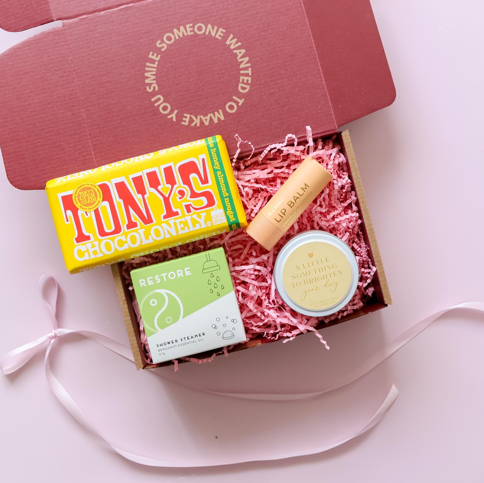 Just because gift box showing Tony's Chocolonely Huxter lip balm shower steamer and Brighten Your Day candle Perth