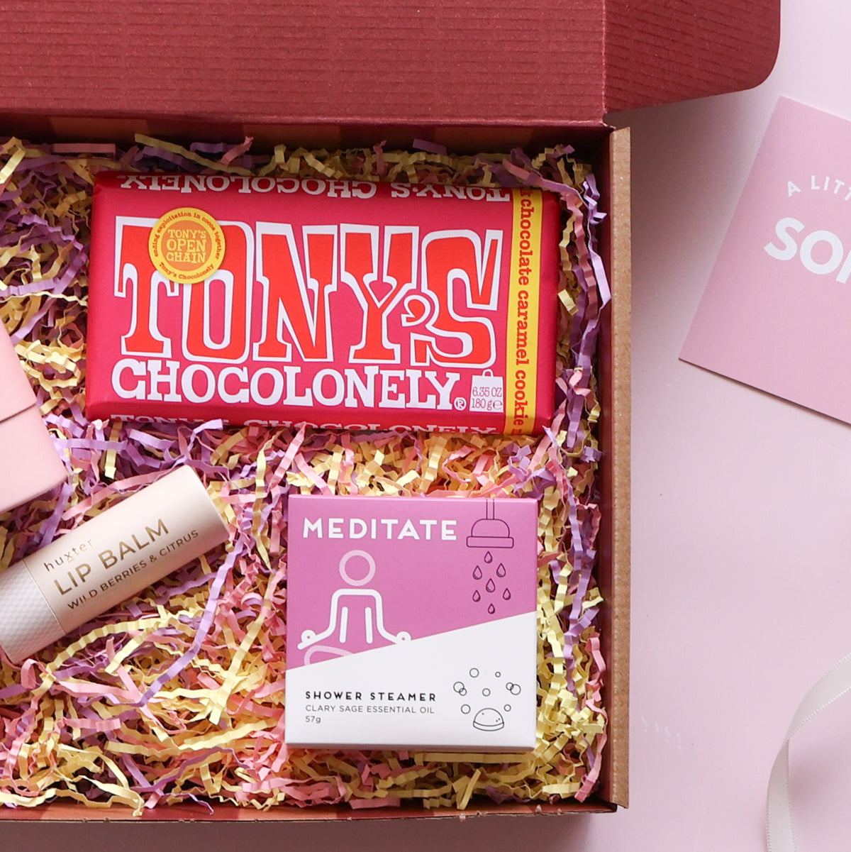 Mini brighten your day gift box with Tony's chocolate, shower steamer and Huxter lip and hand cream duo
