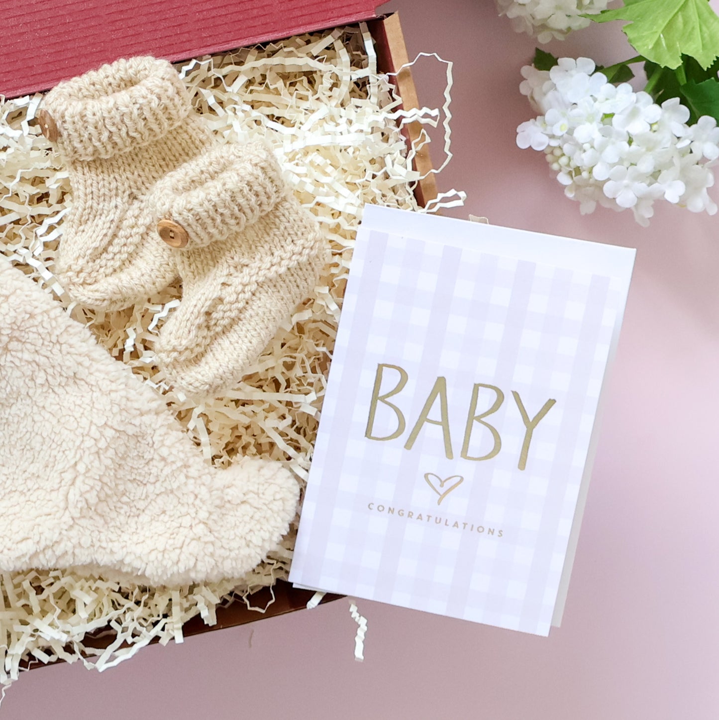 Mini knitted newborn gift box with hand knitted Scottish baby booties and Baby Congratulations card