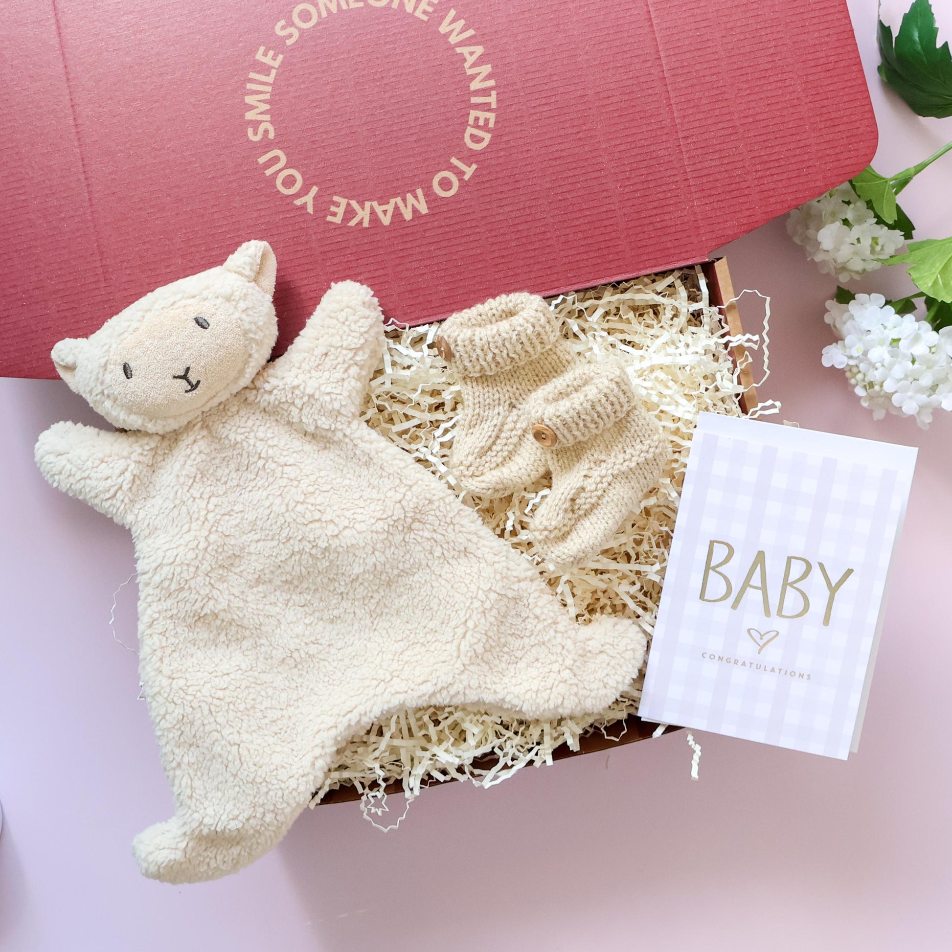 Mini comforter newborn gift box with lamb comforter, hand knitted booties and Baby Congratulations card