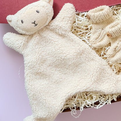 Mini comforter newborn gift box featuring soft lamb comforter and hand knitted booties