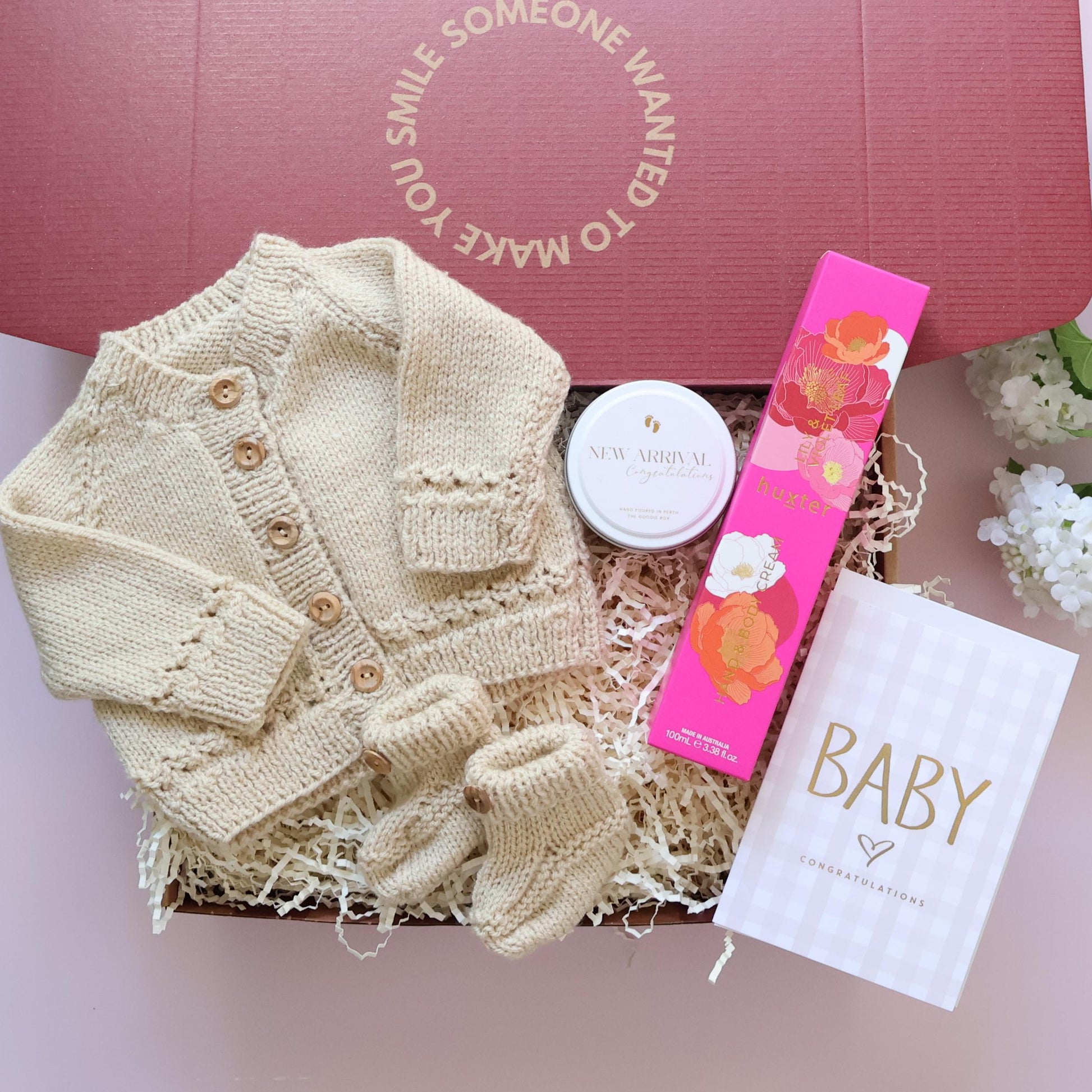 Hand Knitted New Baby Girl Gift Box with cardigan, booties, New Arrival candle, Huxter body cream and Baby card