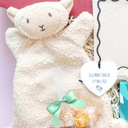 Personalised New Baby Gift Box featuring lamb comforter, ceramic name keepsake heart and Lindt chocolates