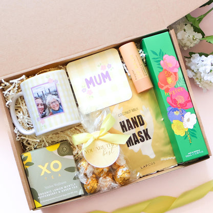 Personalised Mother's Day hamper Perth featuring photo mug, MUM coaster, XO Tea, Lapcos hand mask, Huxter lip balm, hand and body cream and gold Lindt truffles by The Goodie Box