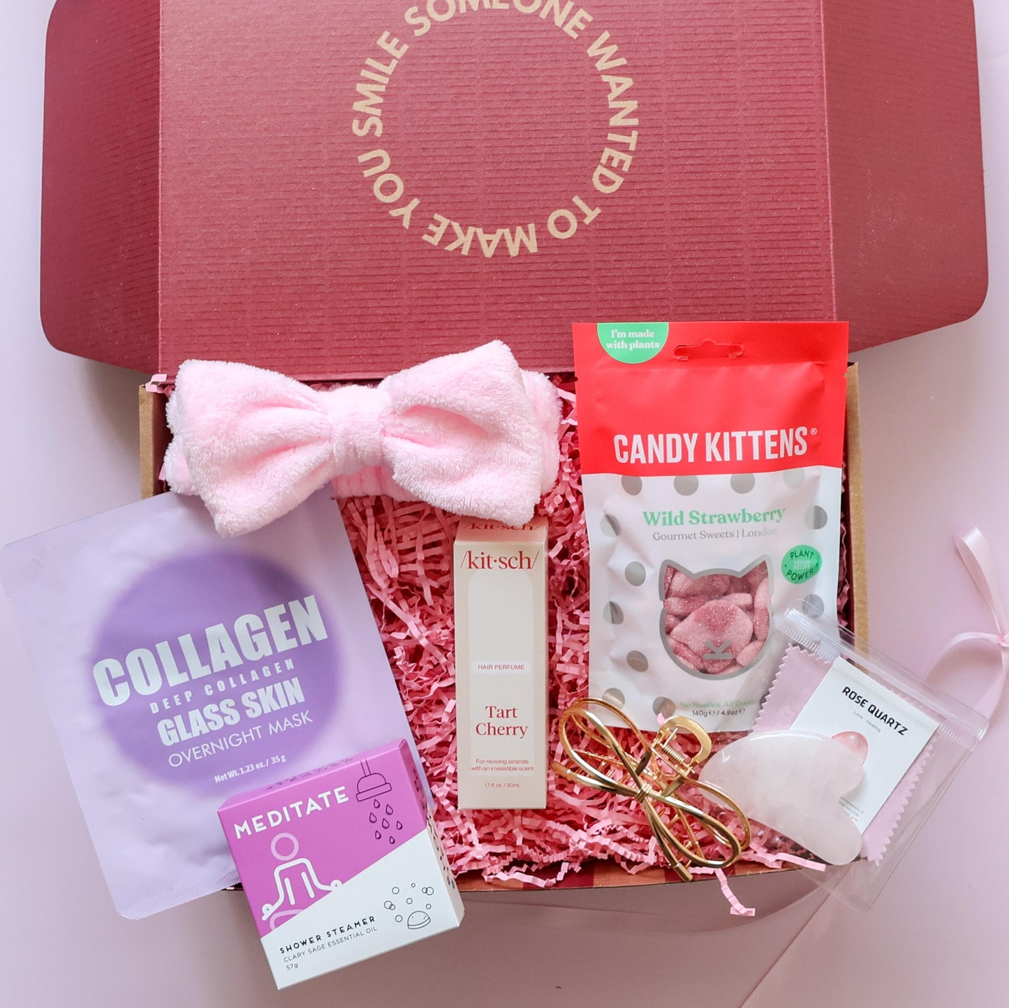 self care gift box with collagen mask, shower steamer, hair perfume, spa headband, gold claw clip, gua sha and Candy Kittens sweets