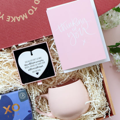 With Sympathy gift box Perth showing Thinking of You greeting card ceramic heart keepsake poem pink tulip mug and XO Tea in branded red box