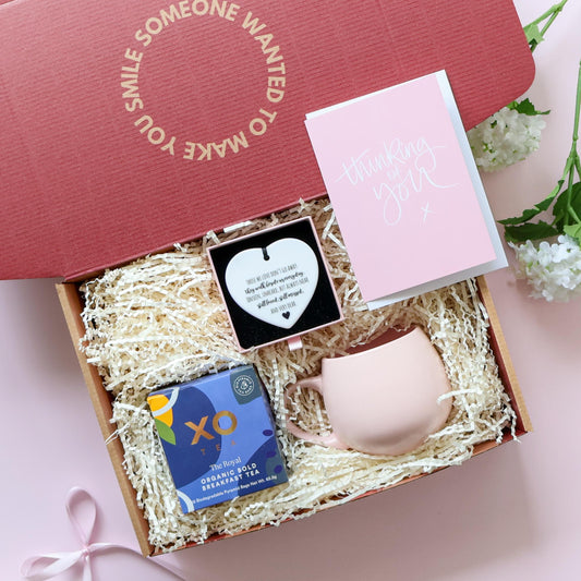 With Sympathy gift box Perth open showing XO Tea organic breakfast tea pink tulip mug ceramic heart keepsake poem and Thinking of You greeting card