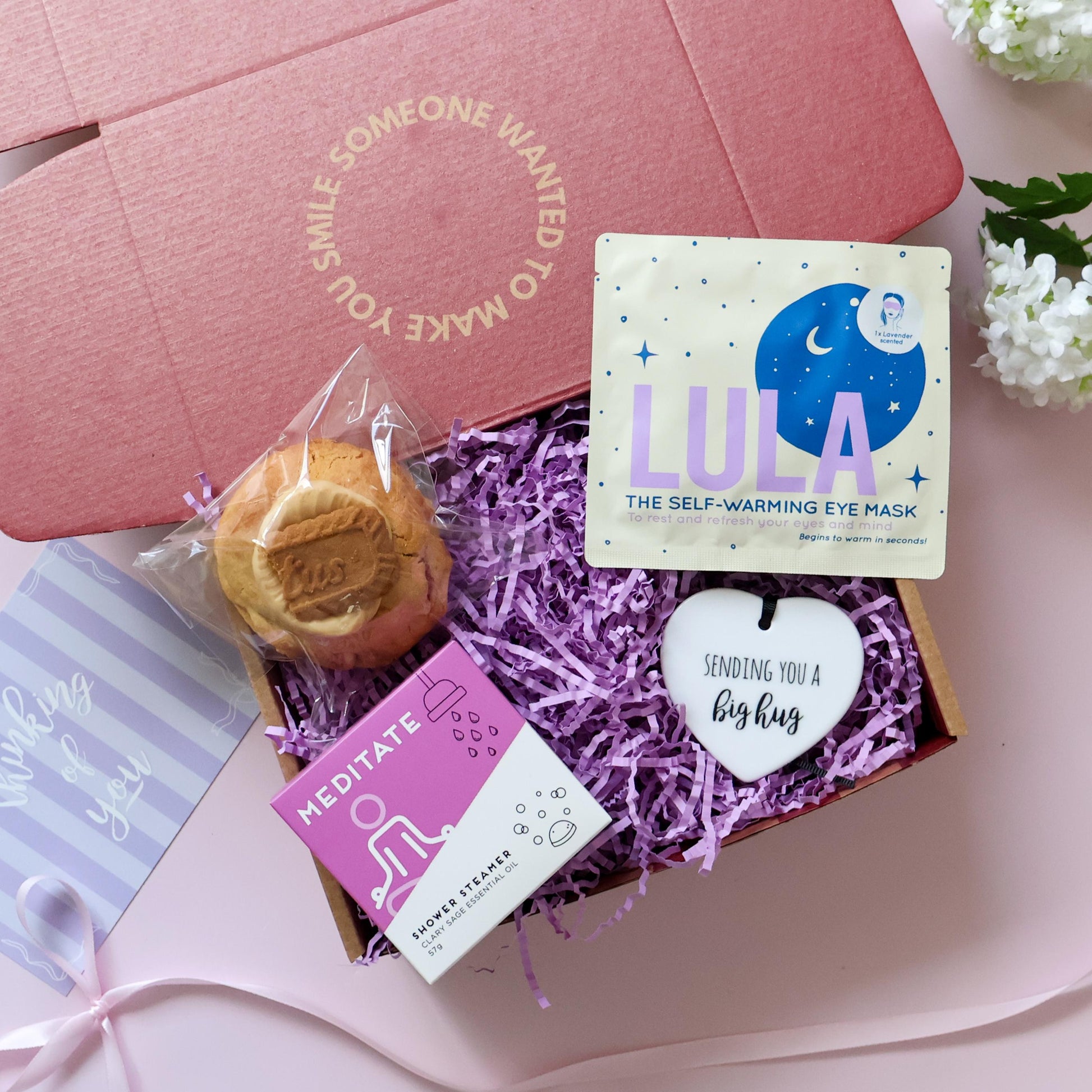 Mini Big Hug Care Package Perth open showing loaded cookie shower steamer warming eye mask and Sending You a Big Hug ceramic heart keepsake