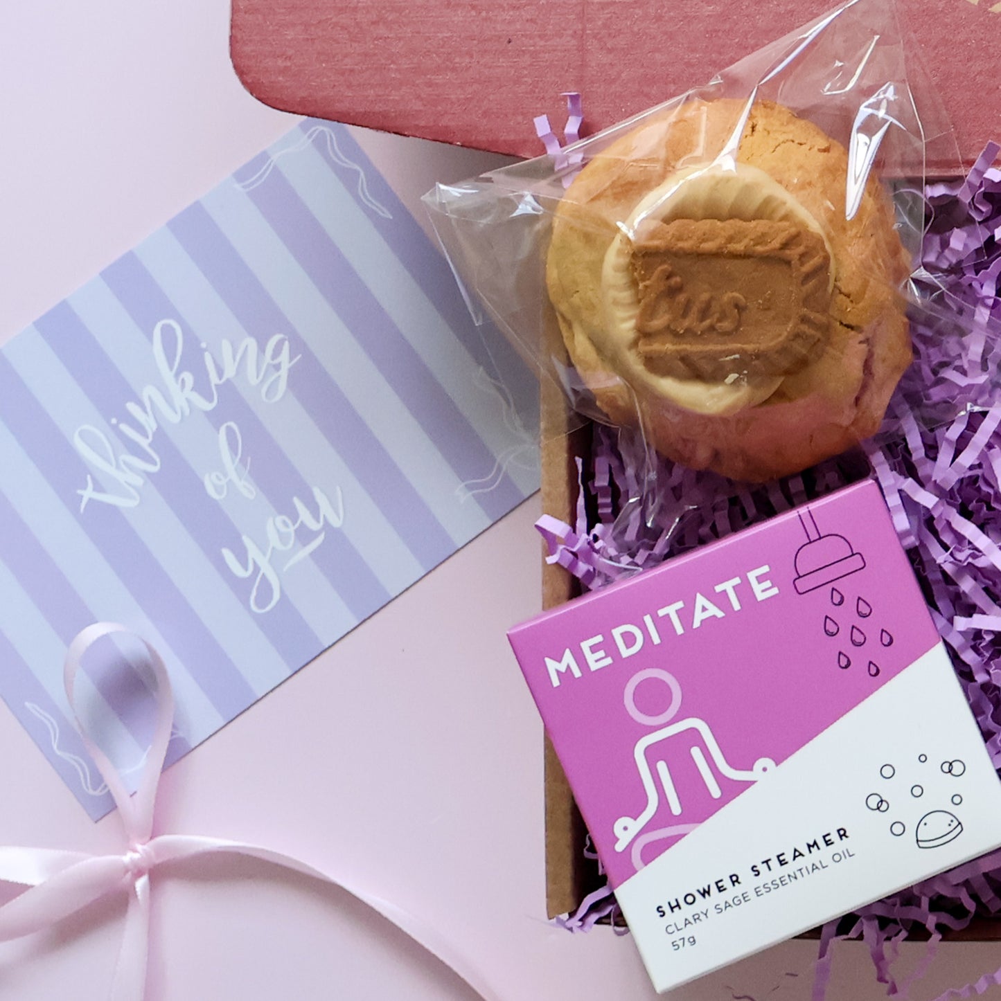 Mini Big Hug Care Package showing loaded cookie and  clary sage shower steamer with Thinking of You card