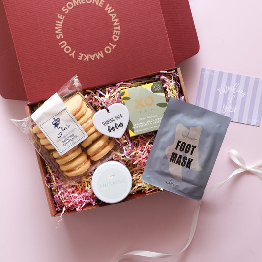 Sending you comfort gift hamper with peppermint foot mask, lemon myrtle tea and big hug ceramic heart