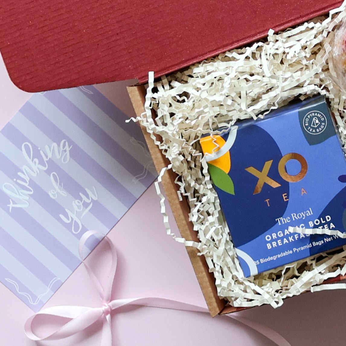 Thinking of you gift box detail showing XO Tea Royal Organic Breakfast Tea with Thinking of You card and pink ribbon.
