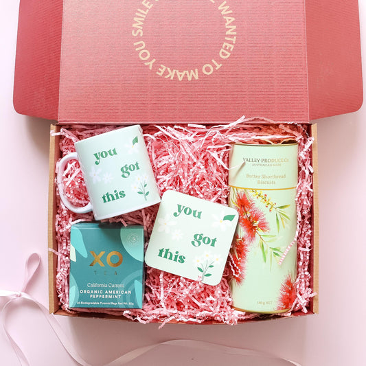 Get well soon care package showing You Got This mug and coaster with XO Tea organic peppermint and Valley Produce Co shortbread Perth